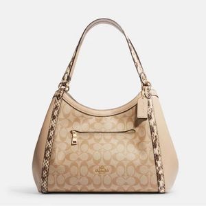 Coach signature Snake Embossed Kristy Handbag